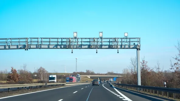 Toll gantry with e-vignette enforcement cameras on the D8 motorway in the Czech Republic. Photo taken on February 20, 2026.